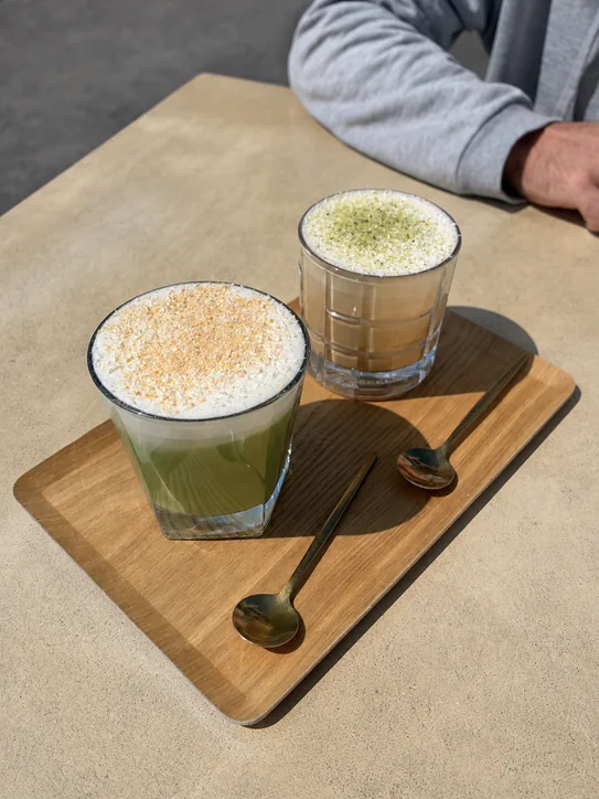 Two colourful café drinks