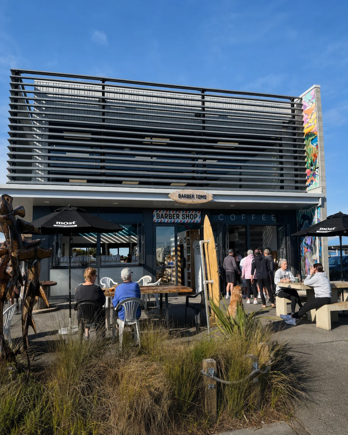 Customers outside Baby Afro Coffee Bar